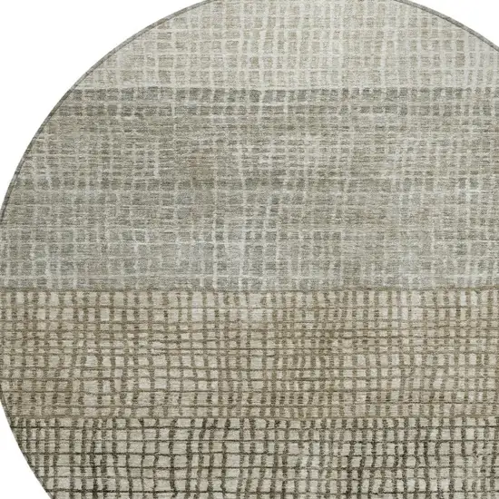 8' Taupe And Ivory Round Geometric Washable Indoor Outdoor Area Rug Photo 8