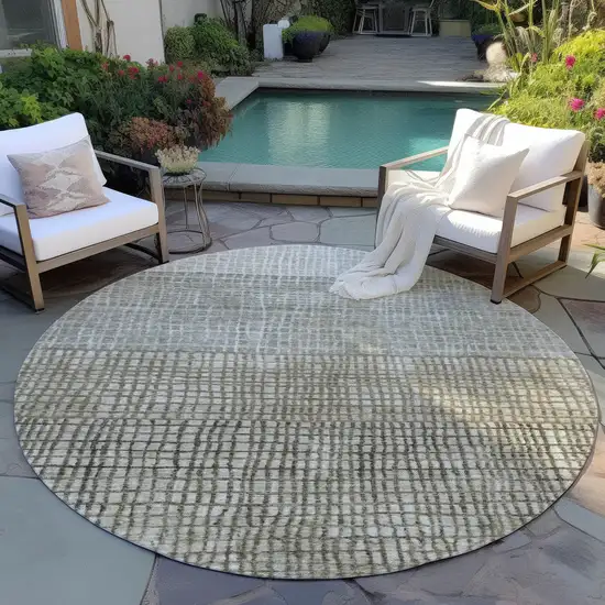 8' Taupe And Ivory Round Geometric Washable Indoor Outdoor Area Rug Photo 5