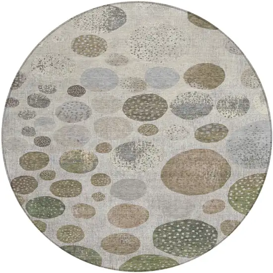 8' Taupe And Ivory Round Geometric Washable Indoor Outdoor Area Rug Photo 1