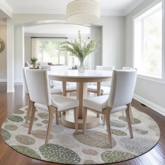 8' Taupe And Ivory Round Geometric Washable Indoor Outdoor Area Rug Photo 6