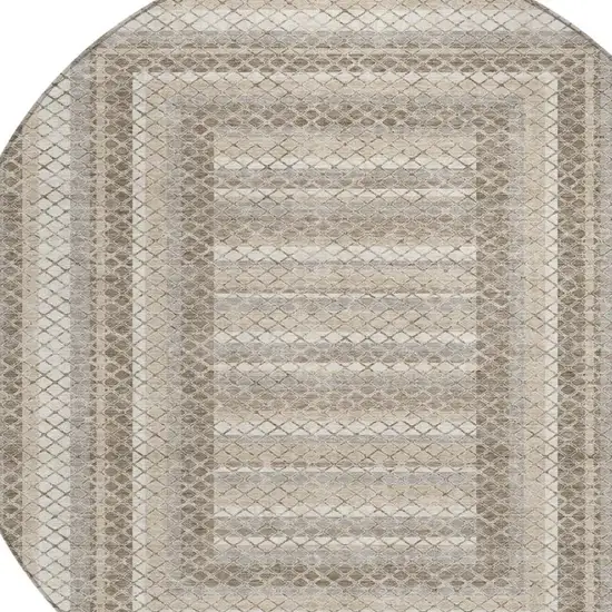8' Taupe And Ivory Round Geometric Washable Indoor Outdoor Area Rug Photo 4