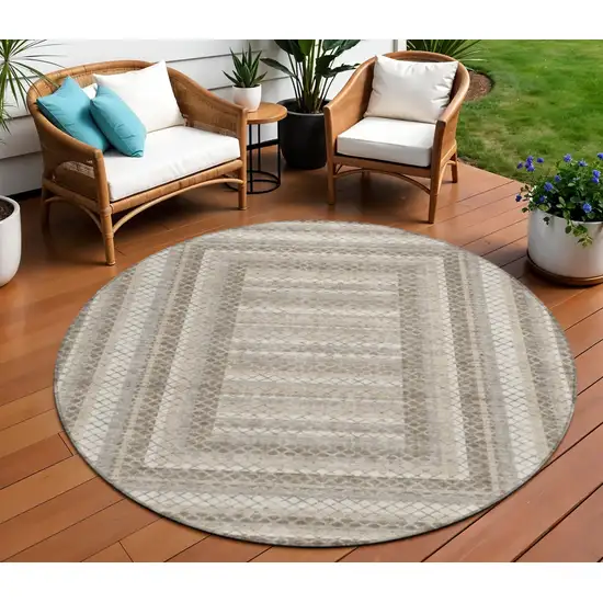 8' Taupe And Ivory Round Geometric Washable Indoor Outdoor Area Rug Photo 2