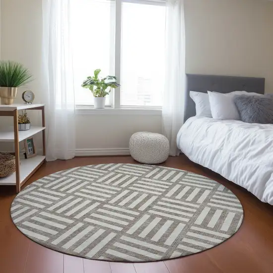 8' Taupe And Ivory Round Geometric Washable Indoor Outdoor Area Rug Photo 7