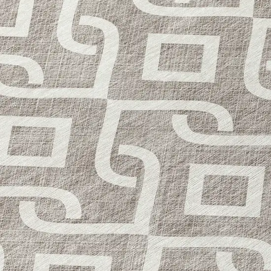 8' Taupe And Ivory Round Geometric Washable Indoor Outdoor Area Rug Photo 8