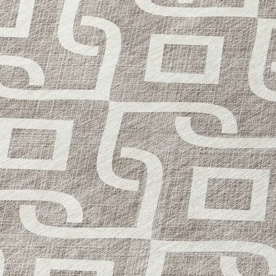 8' Taupe And Ivory Round Geometric Washable Indoor Outdoor Area Rug Photo 8