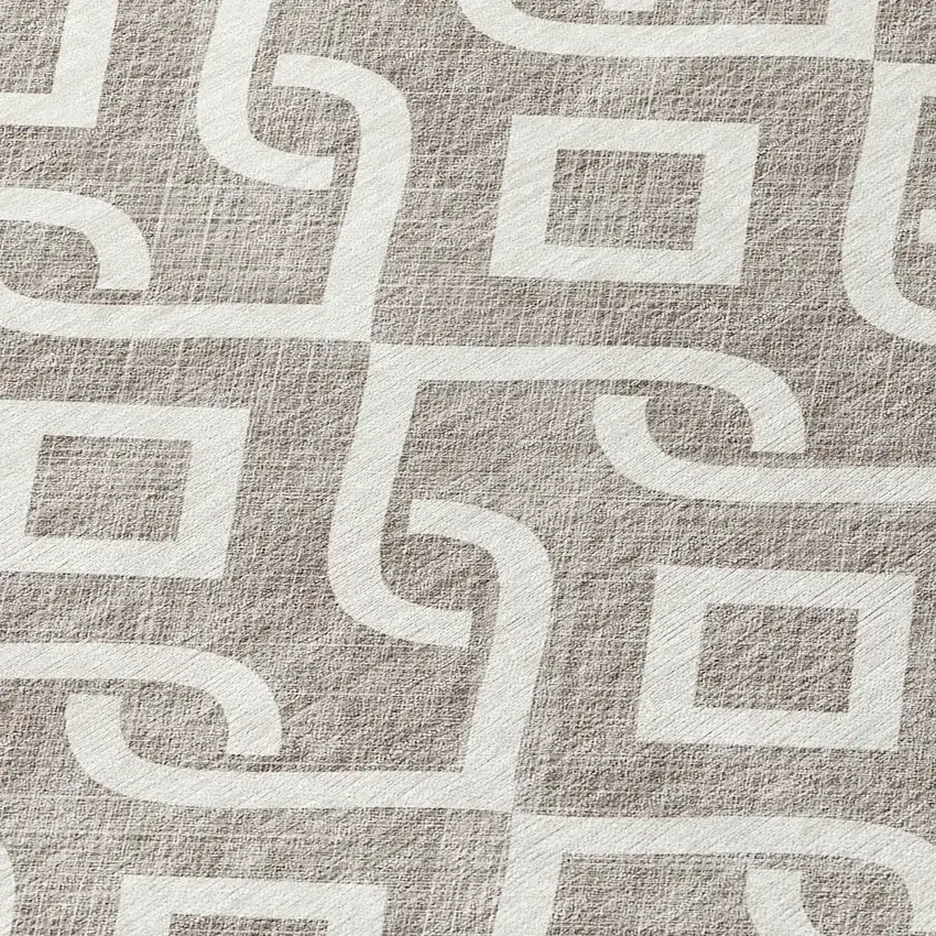 8' Taupe And Ivory Round Geometric Washable Indoor Outdoor Area Rug Photo 8