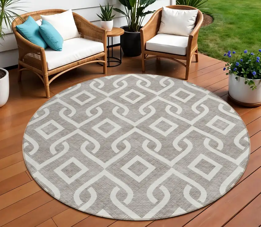 8' Taupe And Ivory Round Geometric Washable Indoor Outdoor Area Rug Photo 1