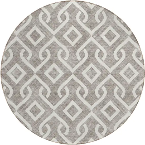 8' Taupe And Ivory Round Geometric Washable Indoor Outdoor Area Rug Photo 2
