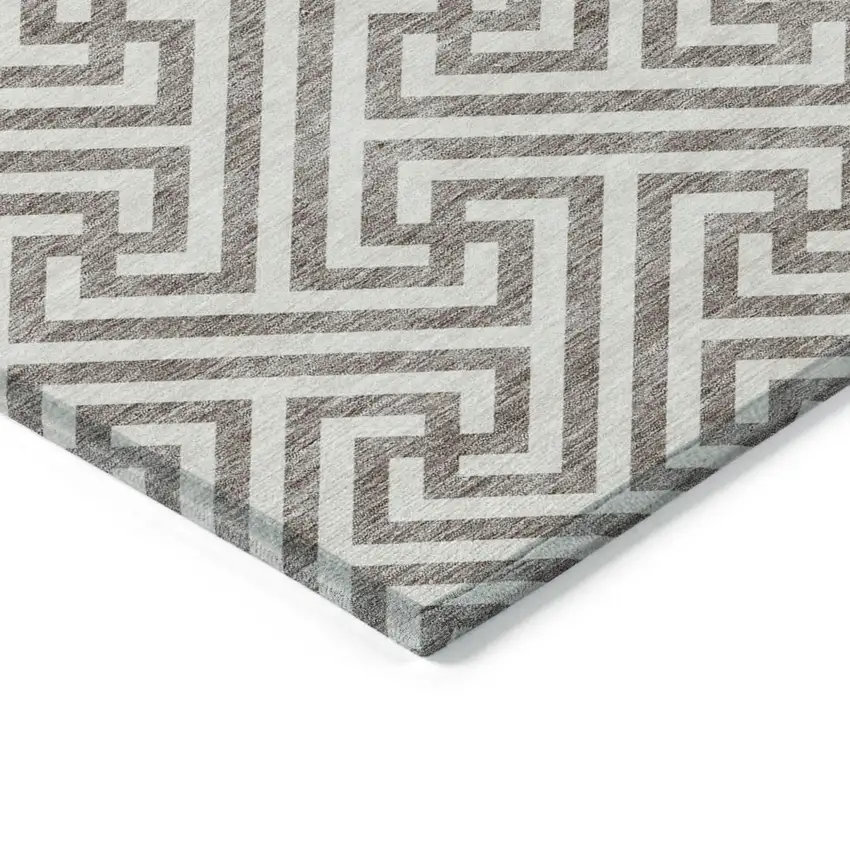 8' Taupe And Ivory Round Geometric Washable Indoor Outdoor Area Rug Photo 4