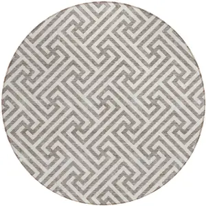 Photo of 8' Taupe And Ivory Round Geometric Washable Indoor Outdoor Area Rug