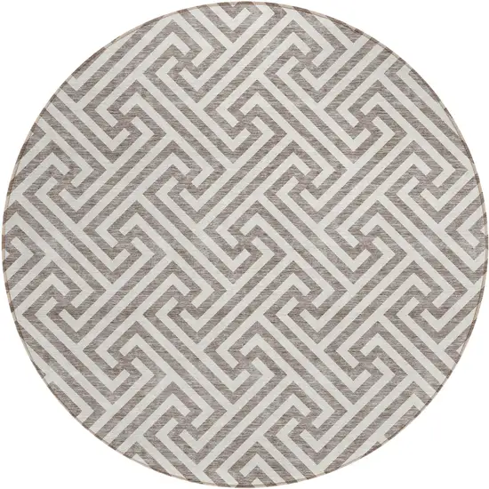 8' Taupe And Ivory Round Geometric Washable Indoor Outdoor Area Rug Photo 1