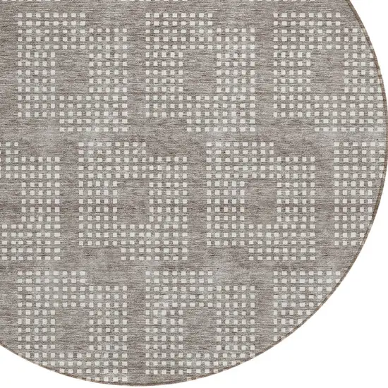 8' Taupe And Ivory Round Geometric Washable Indoor Outdoor Area Rug Photo 4