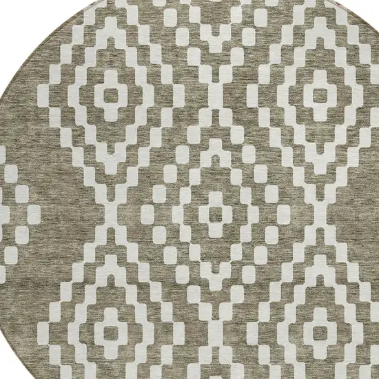8' Taupe And Ivory Round Geometric Washable Indoor Outdoor Area Rug Photo 5
