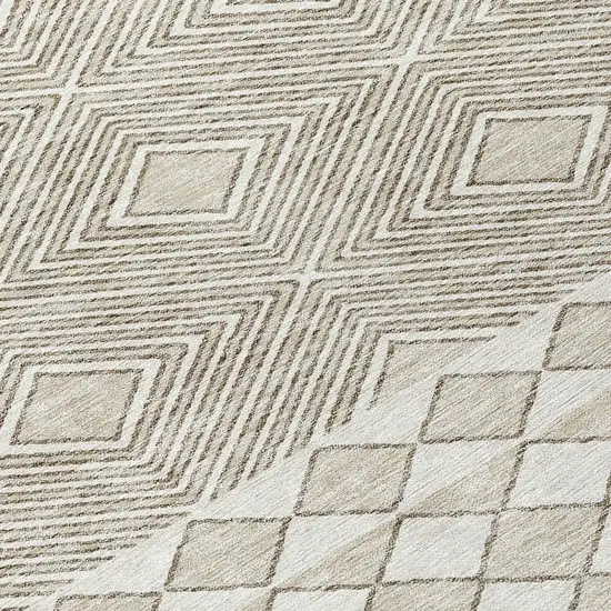 8' Taupe And Ivory Round Geometric Washable Indoor Outdoor Area Rug Photo 8