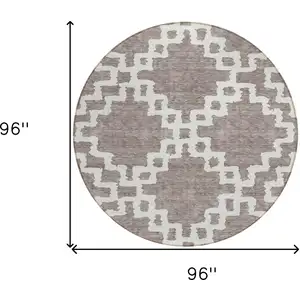 Photo of 8' Taupe And Ivory Round Geometric Washable Indoor Outdoor Area Rug
