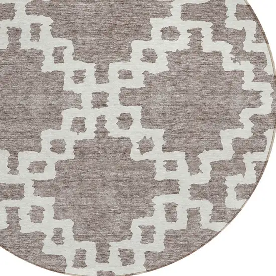 8' Taupe And Ivory Round Geometric Washable Indoor Outdoor Area Rug Photo 4