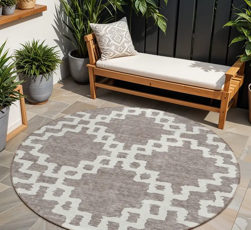 8' Taupe And Ivory Round Geometric Washable Indoor Outdoor Area Rug Photo 1