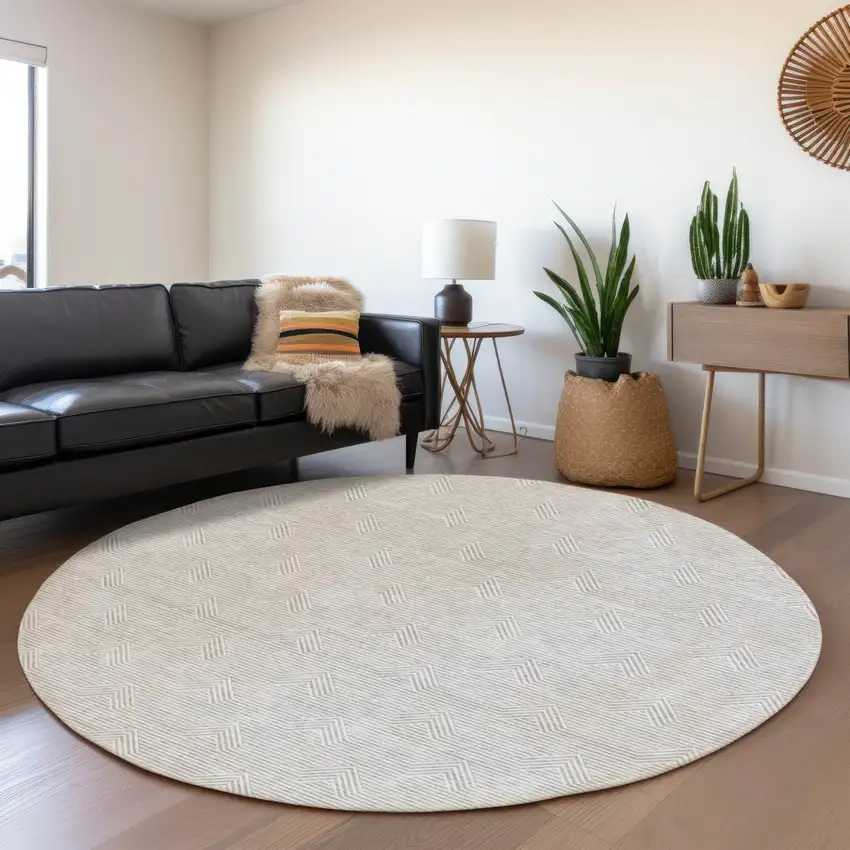 8' Taupe And Ivory Round Geometric Washable Indoor Outdoor Area Rug Photo 6