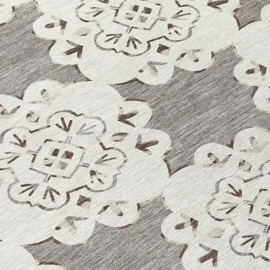 8' Taupe And Ivory Round Quatrefoil Washable Indoor Outdoor Area Rug Photo 9