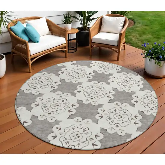 8' Taupe And Ivory Round Quatrefoil Washable Indoor Outdoor Area Rug Photo 1
