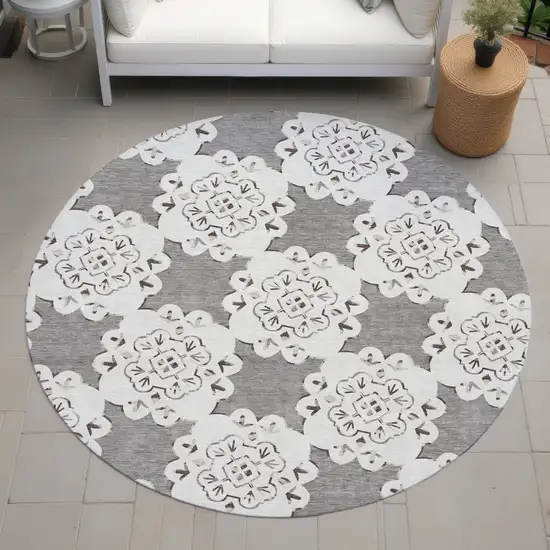 8' Taupe And Ivory Round Quatrefoil Washable Indoor Outdoor Area Rug Photo 7