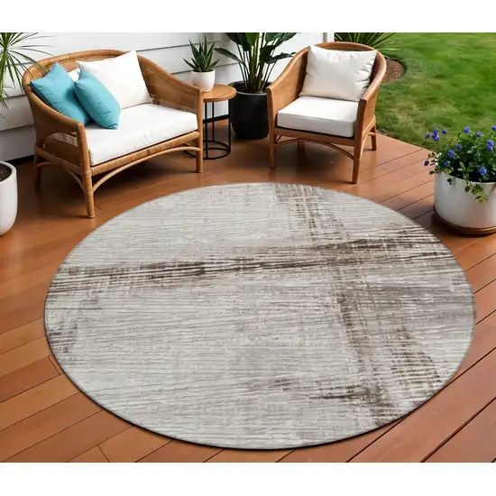 8' Taupe And Ivory Round Striped Washable Indoor Outdoor Area Rug Photo 2