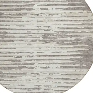 Photo of 8' Taupe And Ivory Round Striped Washable Indoor Outdoor Area Rug