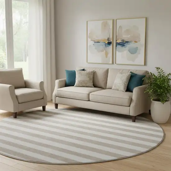 8' Taupe And Ivory Striped Washable Round Rug With UV Protection Photo 1