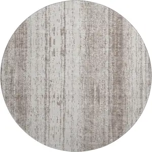 Photo of 8' Taupe And Ivory Striped Washable Round Rug With UV Protection