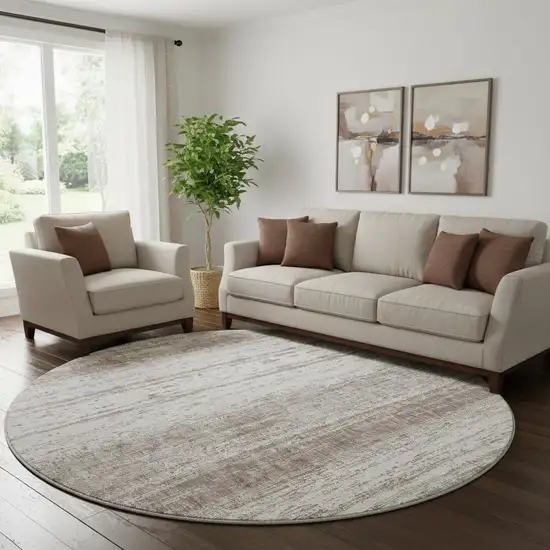 8' Taupe And Ivory Striped Washable Round Rug With UV Protection Photo 1