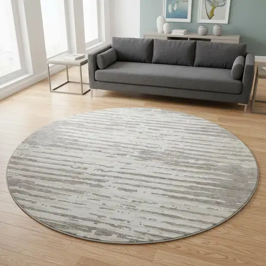 8' Taupe And Ivory Striped Washable Round Rug With UV Protection Photo 2