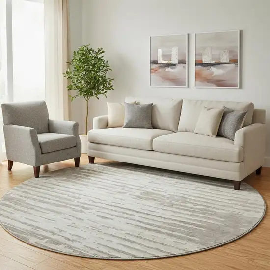 8' Taupe And Ivory Striped Washable Round Rug With UV Protection Photo 1
