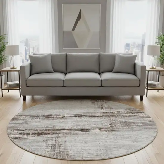 8' Taupe And Ivory Striped Washable Round Rug With UV Protection Photo 2