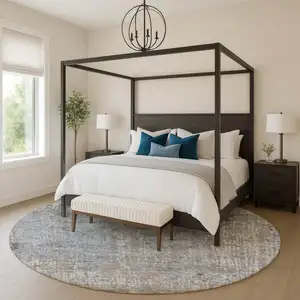 Photo of 8' Taupe And Khaki Abstract Washable Round Rug With UV Protection