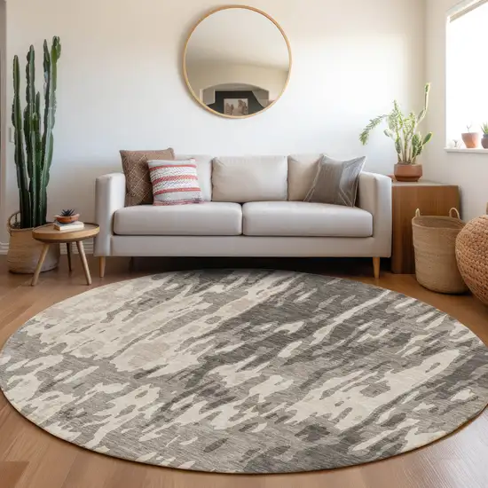 8' Taupe Beige And Ivory Abstract Washable Round Rug With UV Protection Photo 4