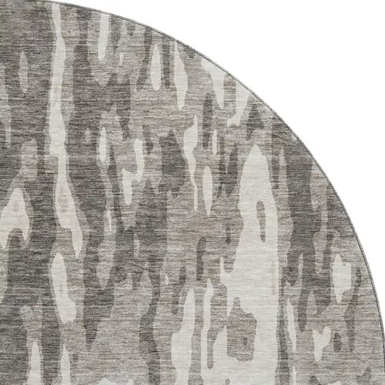 8' Taupe Beige And Ivory Abstract Washable Round Rug With UV Protection Photo 2