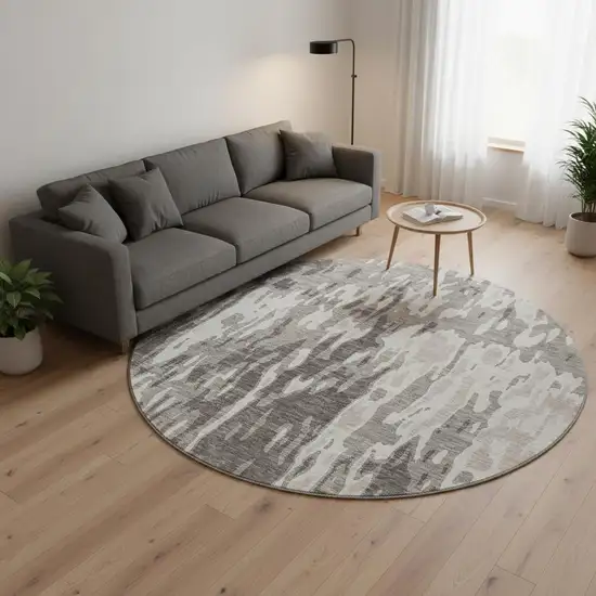 8' Taupe Beige And Ivory Abstract Washable Round Rug With UV Protection Photo 2