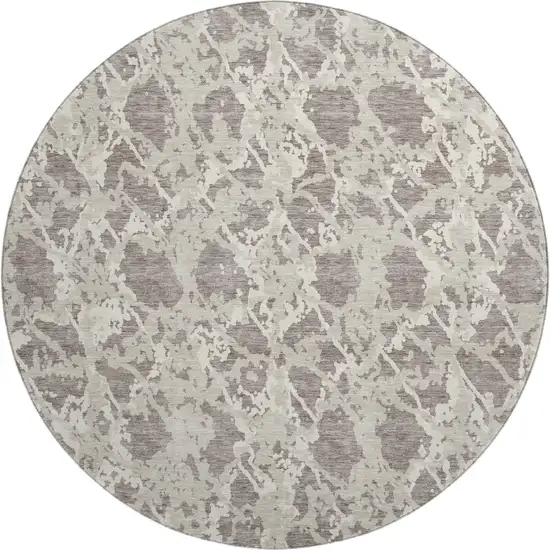 8' Taupe Beige And Ivory Abstract Washable Round Rug With UV Protection Photo 1