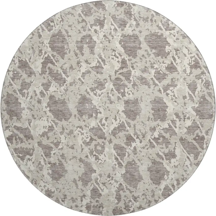 8' Taupe Beige And Ivory Abstract Washable Round Rug With UV Protection Photo 1