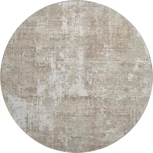 Photo of 8' Taupe Beige And Ivory Abstract Washable Round Rug With UV Protection