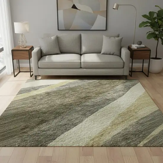 8' Taupe Beige And Ivory Abstract Washable Round Rug With UV Protection Photo 2