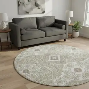 Photo of 8' Taupe Beige And Ivory Floral Washable Round Rug With UV Protection
