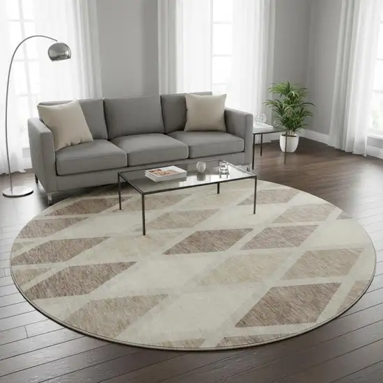 8' Taupe Beige And Ivory Geometric Washable Round Rug With UV Protection Photo 2