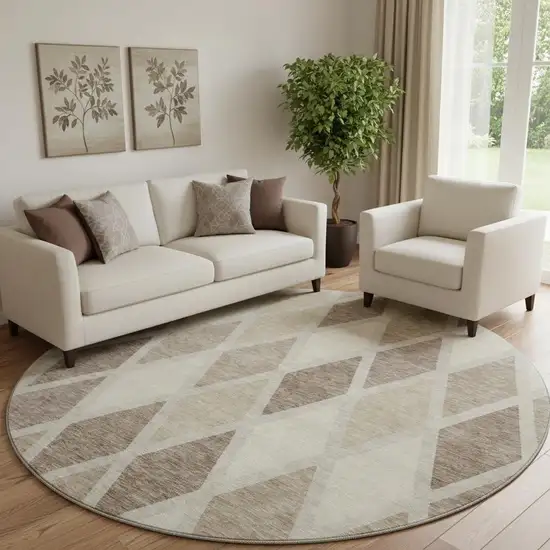 8' Taupe Beige And Ivory Geometric Washable Round Rug With UV Protection Photo 1
