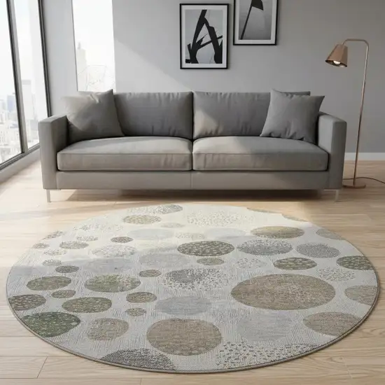 8' Taupe Beige And Ivory Geometric Washable Round Rug With UV Protection Photo 2