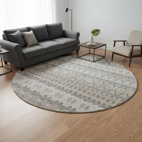 8' Taupe Beige And Ivory Ikat Washable Round Rug With UV Protection Photo 2