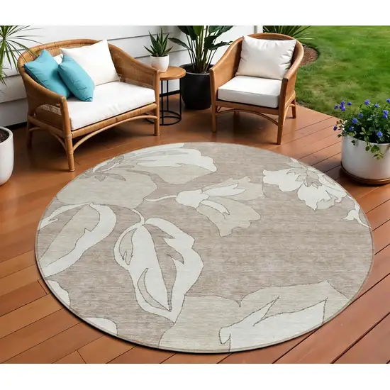 8' Taupe Beige And Ivory Round Floral Washable Indoor Outdoor Area Rug Photo 1
