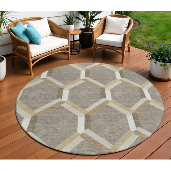 8' Taupe Beige And Ivory Round Geometric Washable Indoor Outdoor Area Rug Photo 1