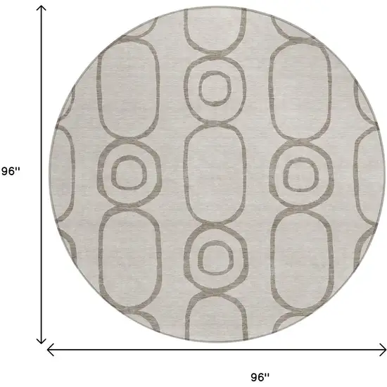 8' Taupe Beige And Ivory Round Geometric Washable Indoor Outdoor Area Rug Photo 3