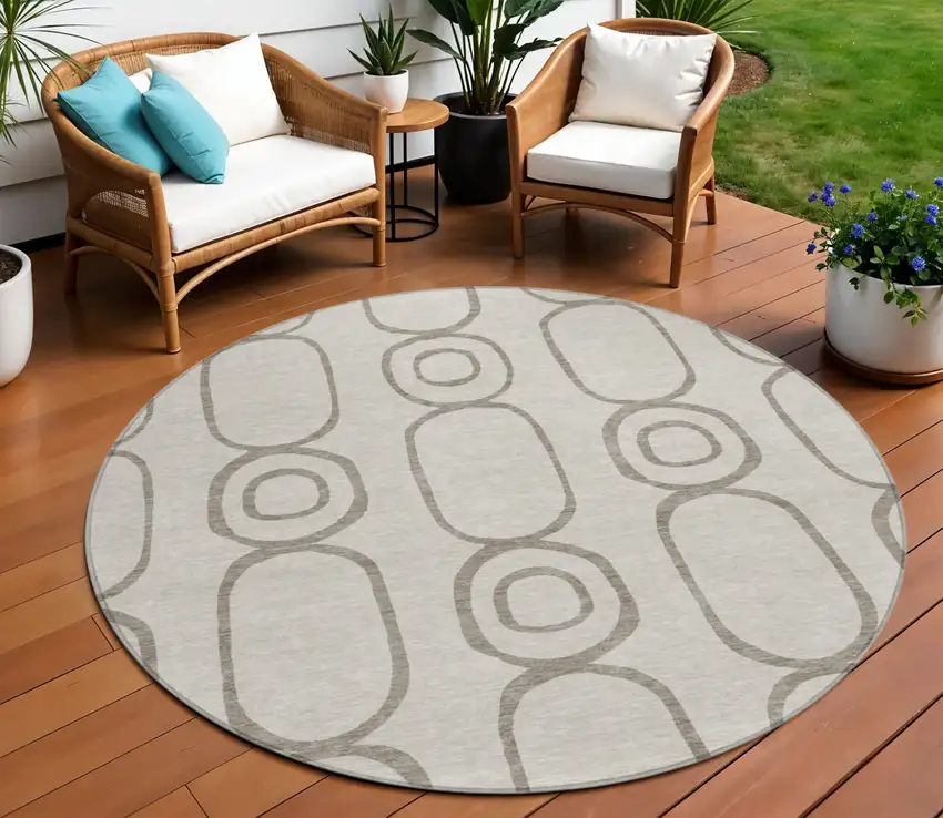 8' Taupe Beige And Ivory Round Geometric Washable Indoor Outdoor Area Rug Photo 1